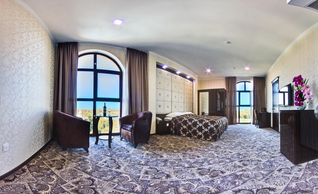 Plaza Hotel Bishkek Quarto foto